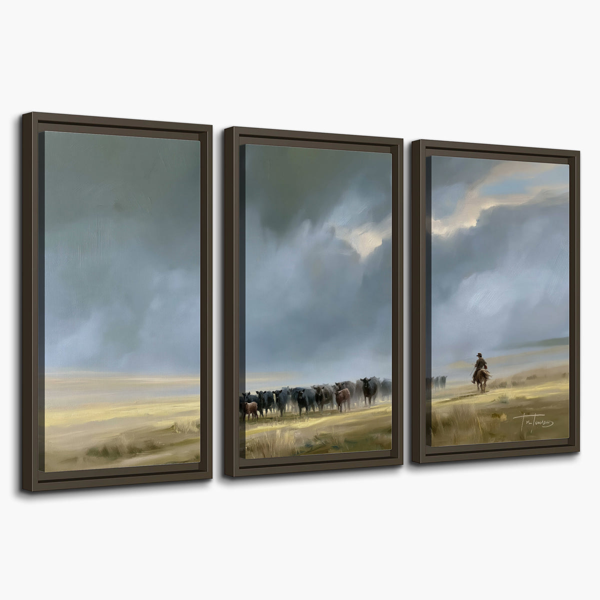 A rider and cattle moving across a sunlit grassland beneath a dramatic blue-gray sky 3 piece framed canvas wall art on a white background