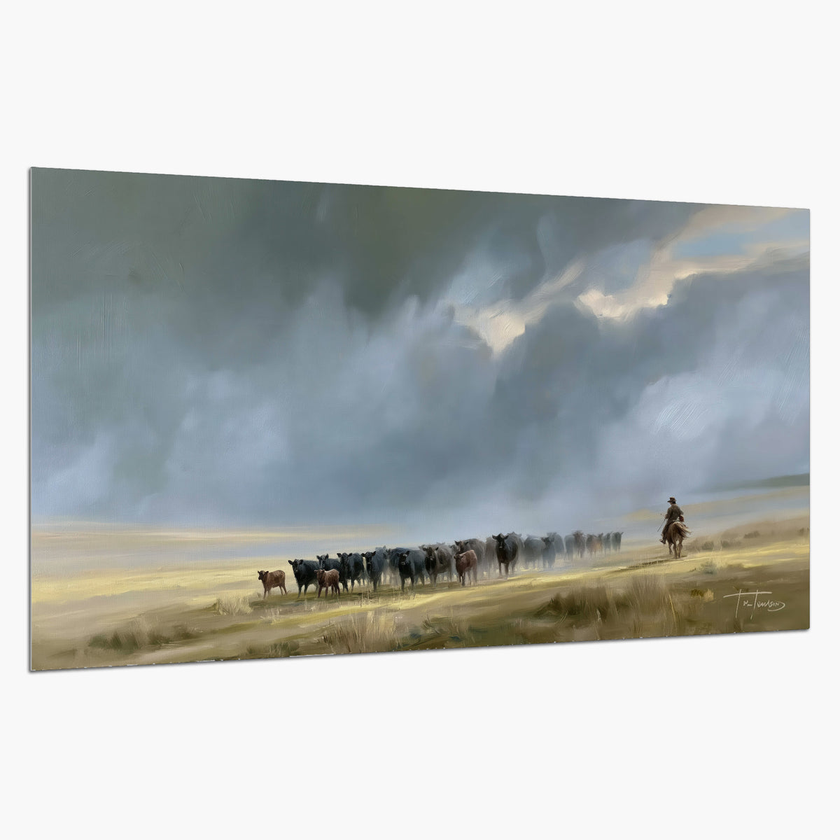 A rider and cattle moving across a sunlit grassland beneath a dramatic blue-gray sky single poster print on a white background