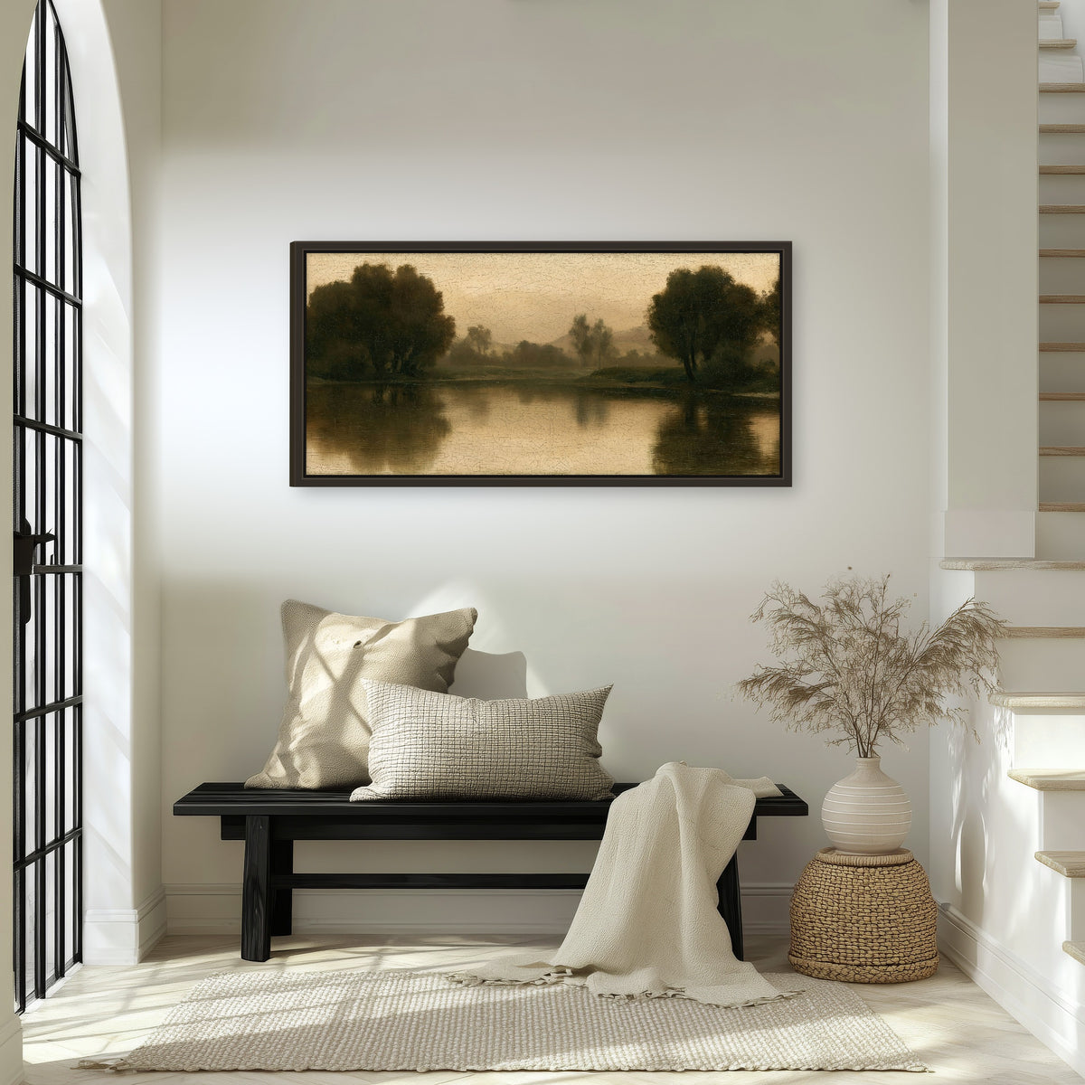 Antique sepia river painting framed canvas wall art in an entryway above a bench
