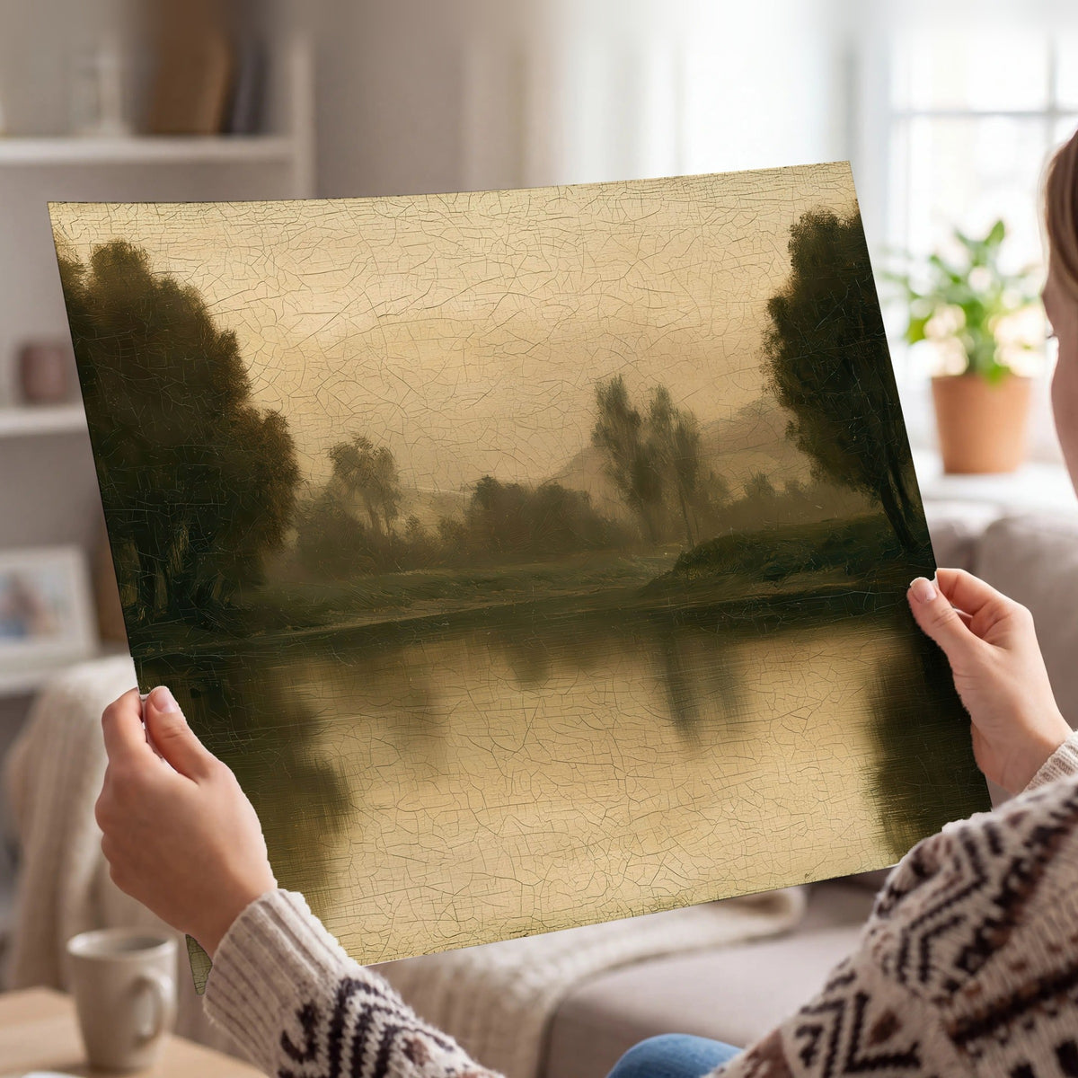 Antique sepia river painting poster print held in hands