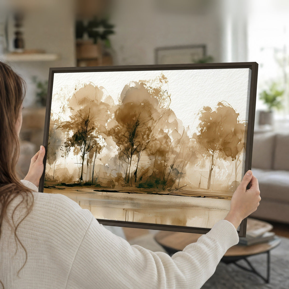 Sepia watercolor lakeside trees painting framed canvas held in hands