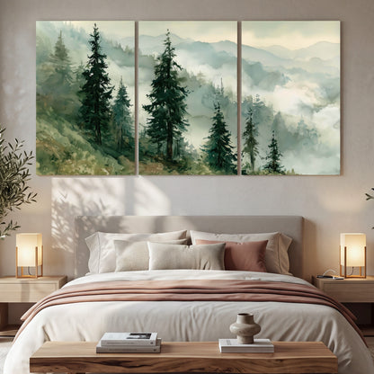 Misty mountain pines watercolor 3 piece canvas wall art in a bedroom above the bed