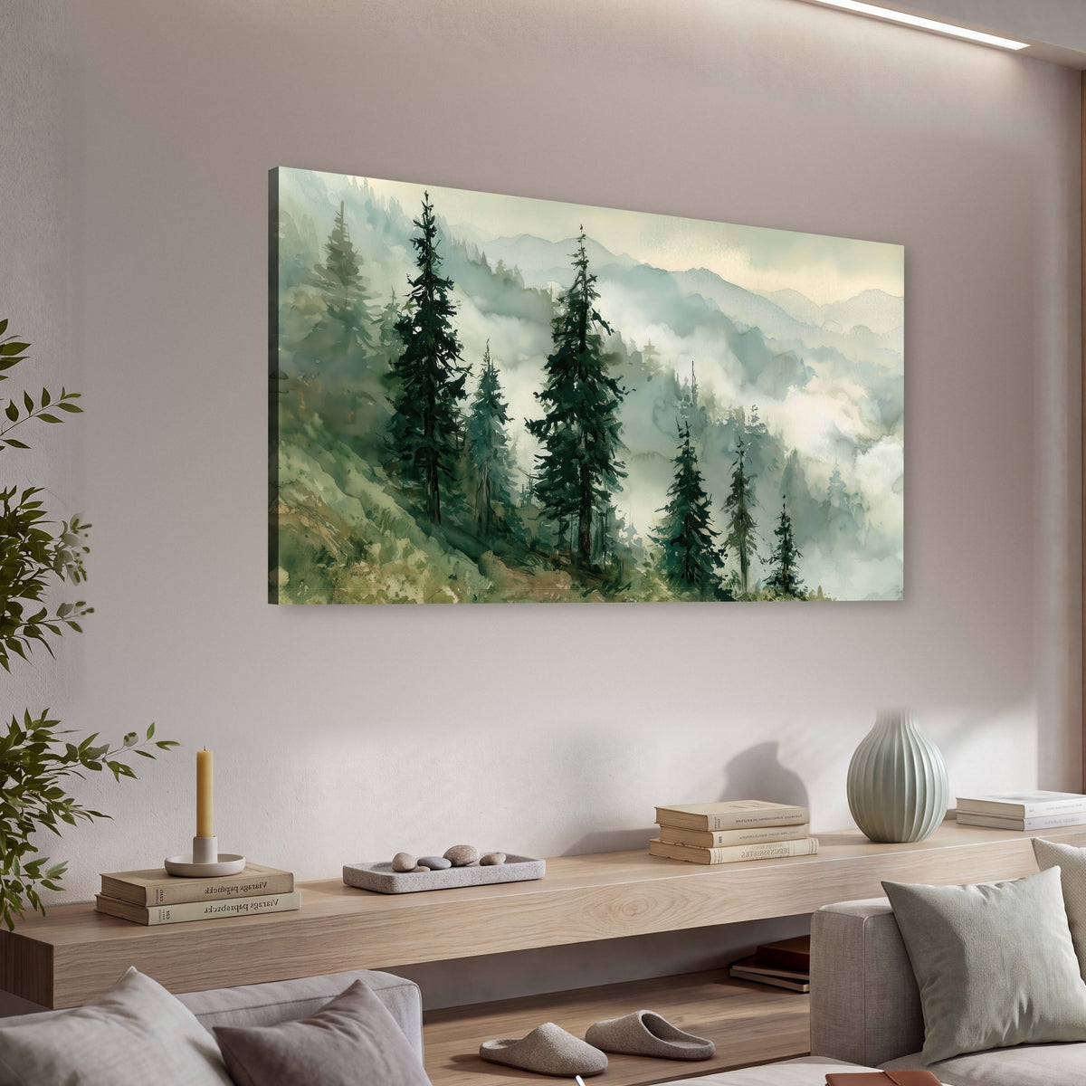 Misty mountain pines watercolor canvas wall art in a living room above a console