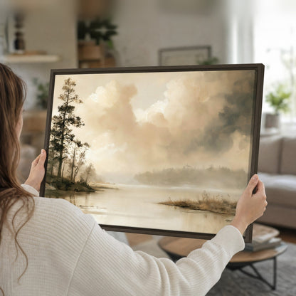 Vintage sepia pine lake painting framed canvas held in hands