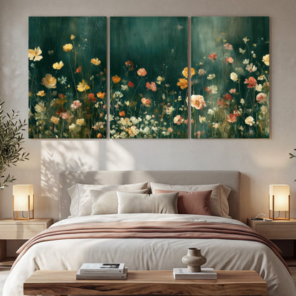 Moody wildflower garden painting 3 piece canvas wall art in a bedroom above the bed