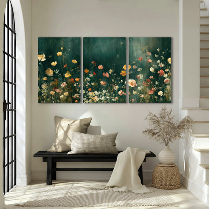 Moody wildflower garden painting 3 piece canvas wall art in an entryway above a bench
