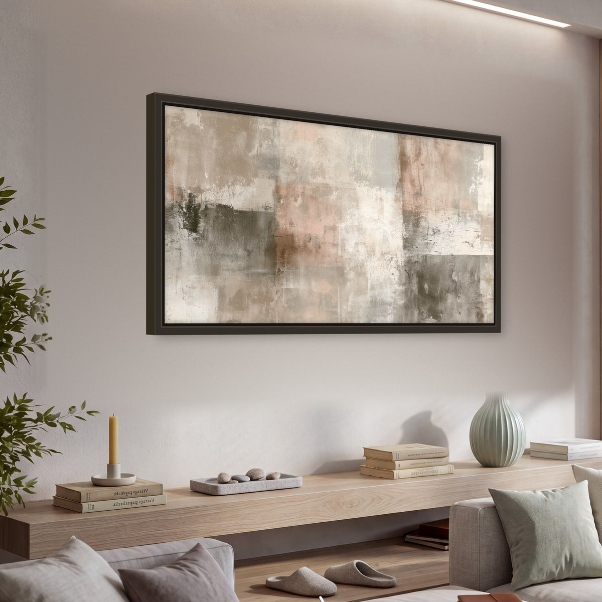 Blush and taupe abstract painting framed canvas wall art in a living room above a console