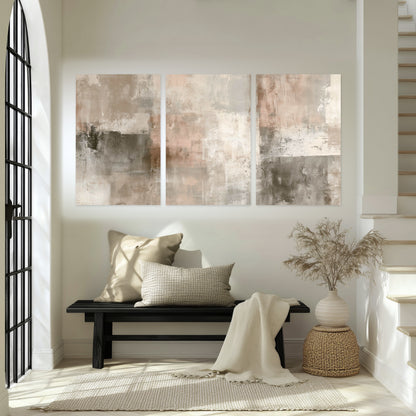 Blush and taupe abstract painting set of 3 poster prints in an entryway above a bench