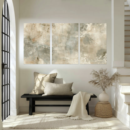 Neutral marble abstract painting set of 3 poster prints in an entryway above a bench