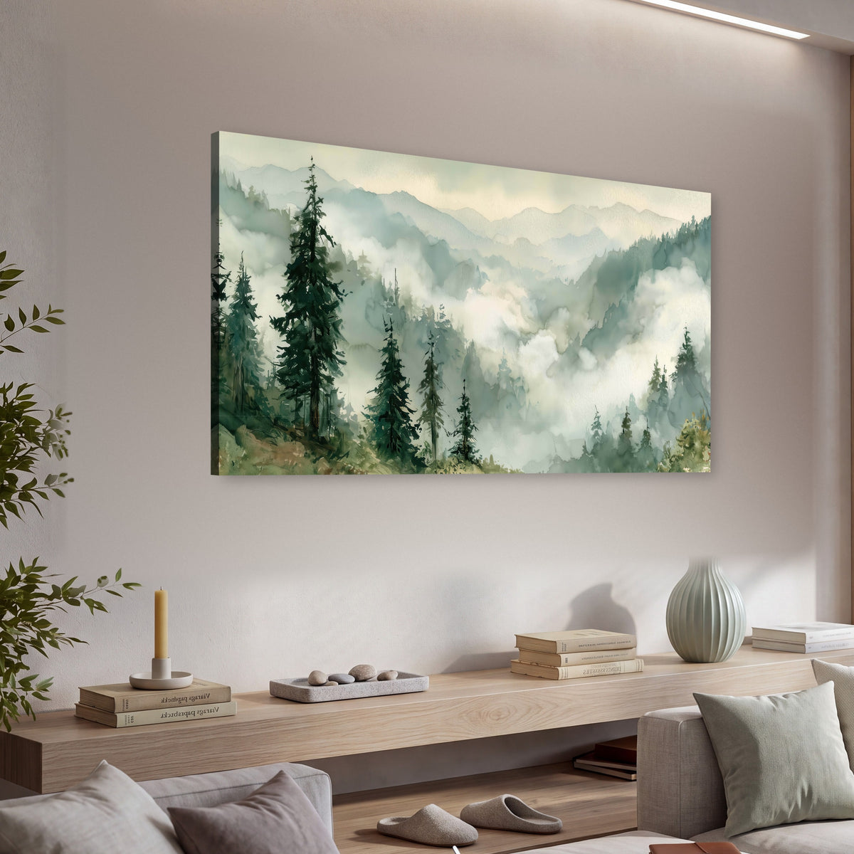 Watercolor misty mountain forest painting canvas wall art in a living room above a console