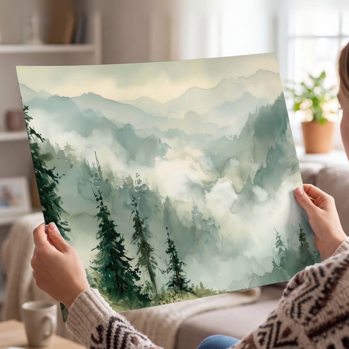 Watercolor misty mountain forest painting poster print held in hands