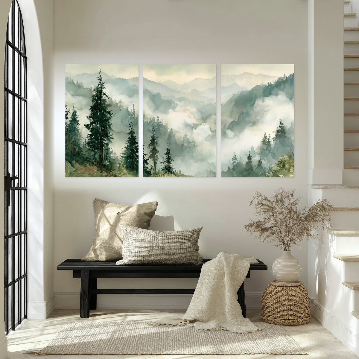 Watercolor misty mountain forest painting set of 3 poster prints in an entryway above a bench