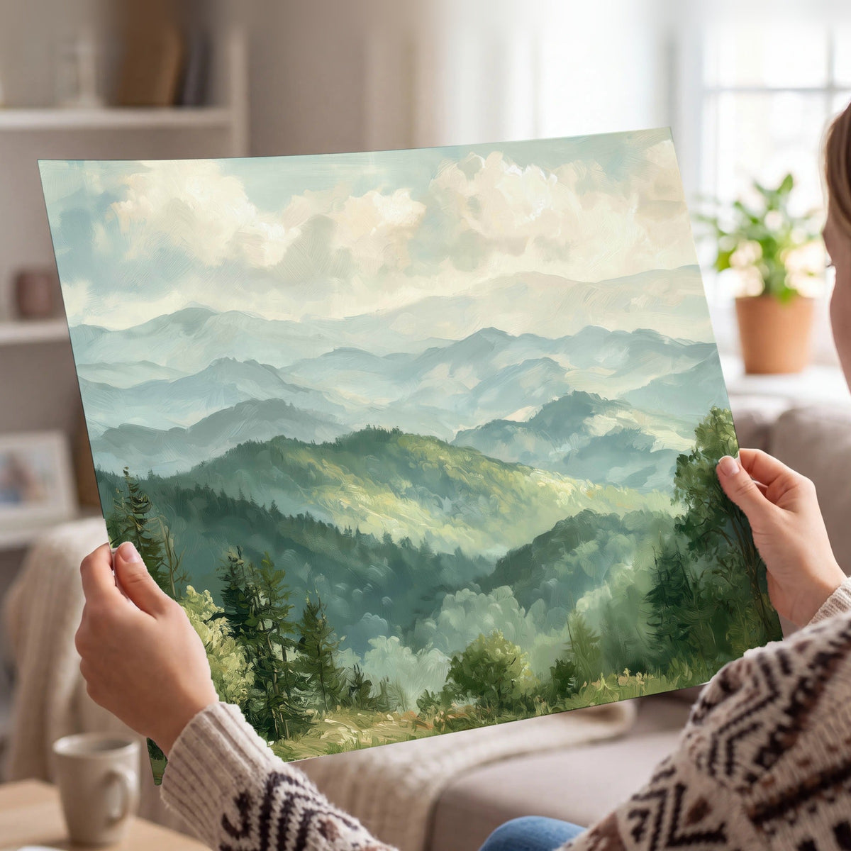 Green mountain valley painting poster print held in hands