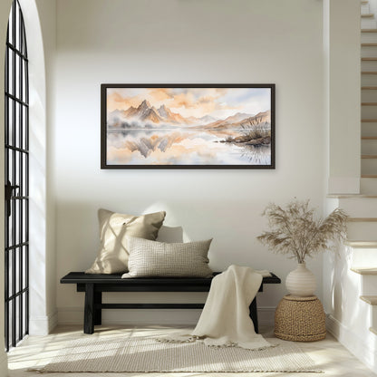 Watercolor mountain lake painting framed canvas wall art in an entryway above a bench