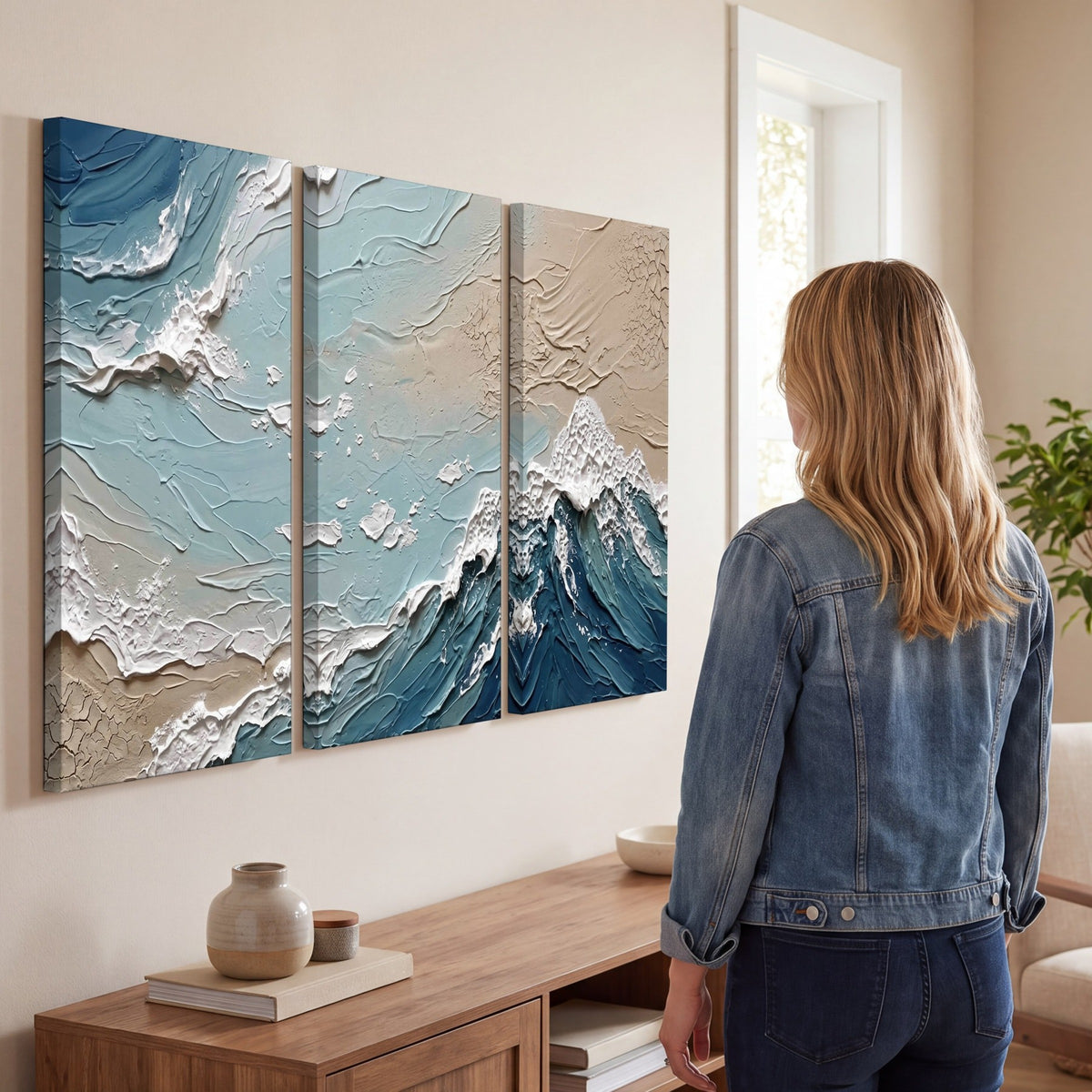Textured ocean wave painting 3 piece canvas wall art in a living room