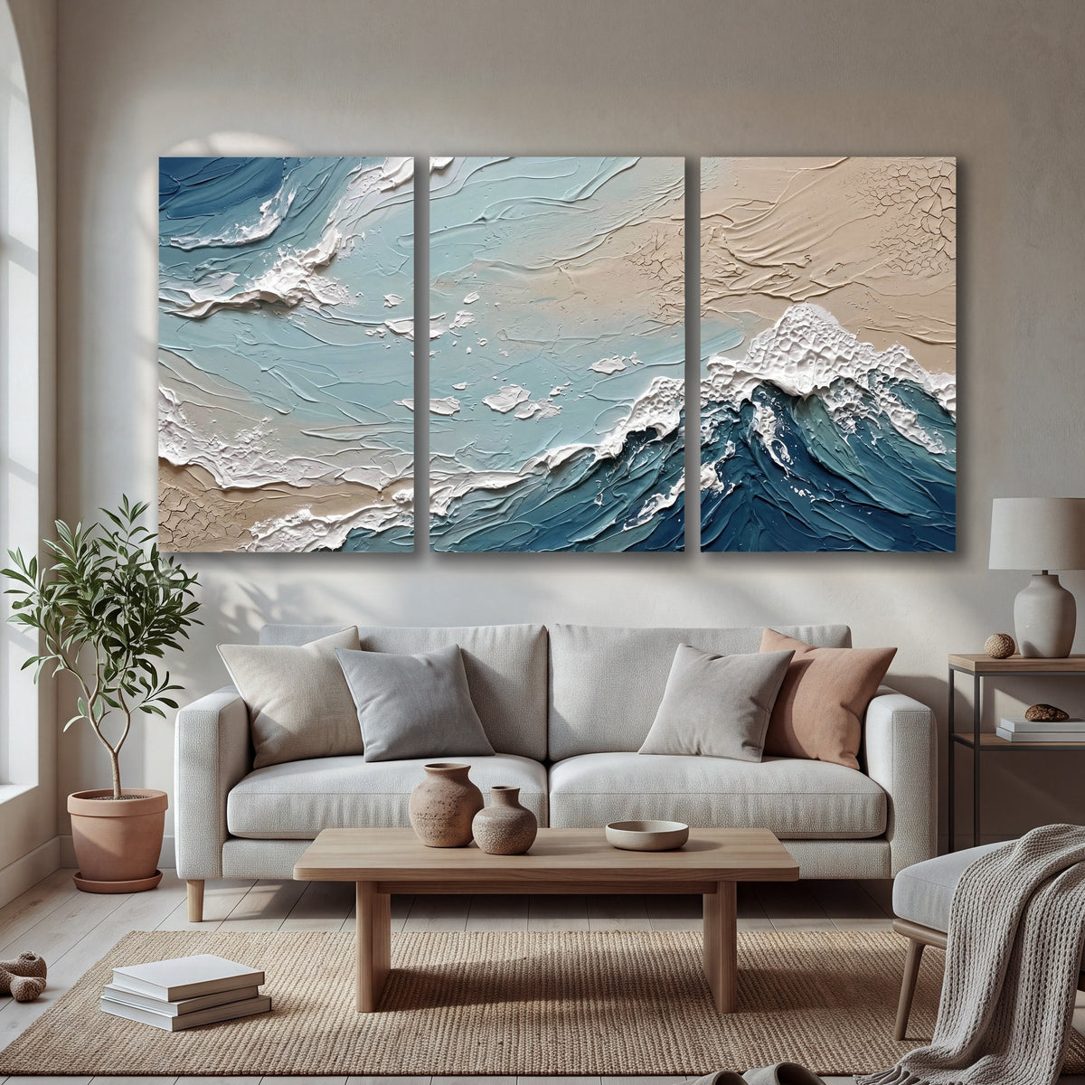 Textured ocean wave painting 3 piece canvas wall art in a bright living room
