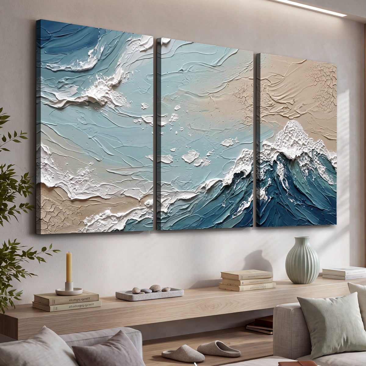 Textured ocean wave painting 3 piece canvas wall art in a living room above a console