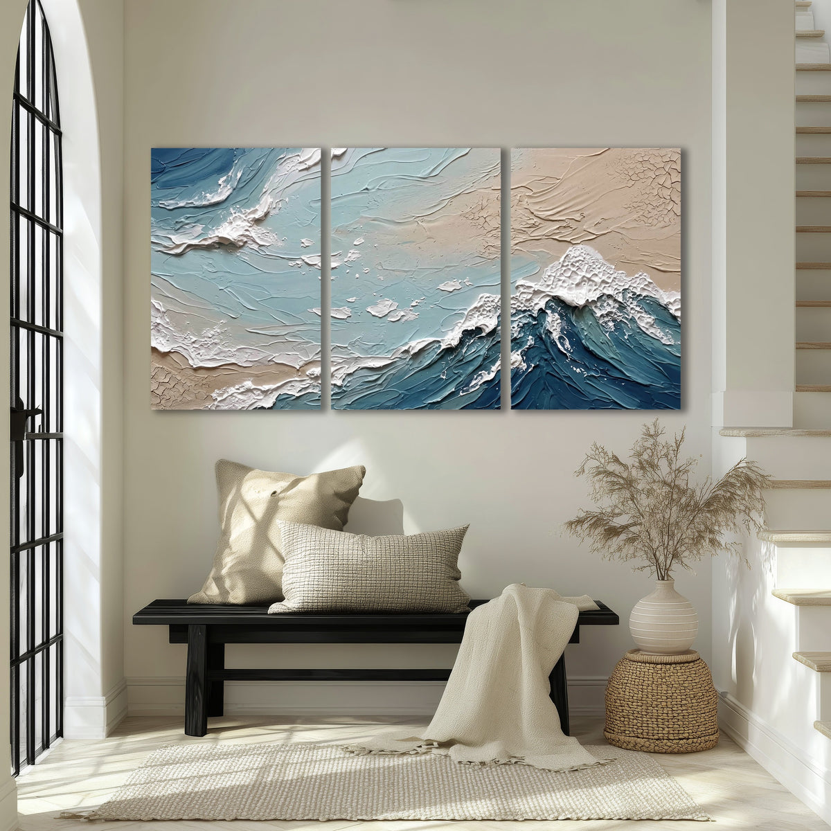 Textured ocean wave painting 3 piece canvas wall art in an entryway above a bench