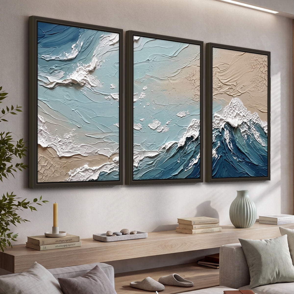 Textured ocean wave painting 3 piece framed canvas in a living room above a console