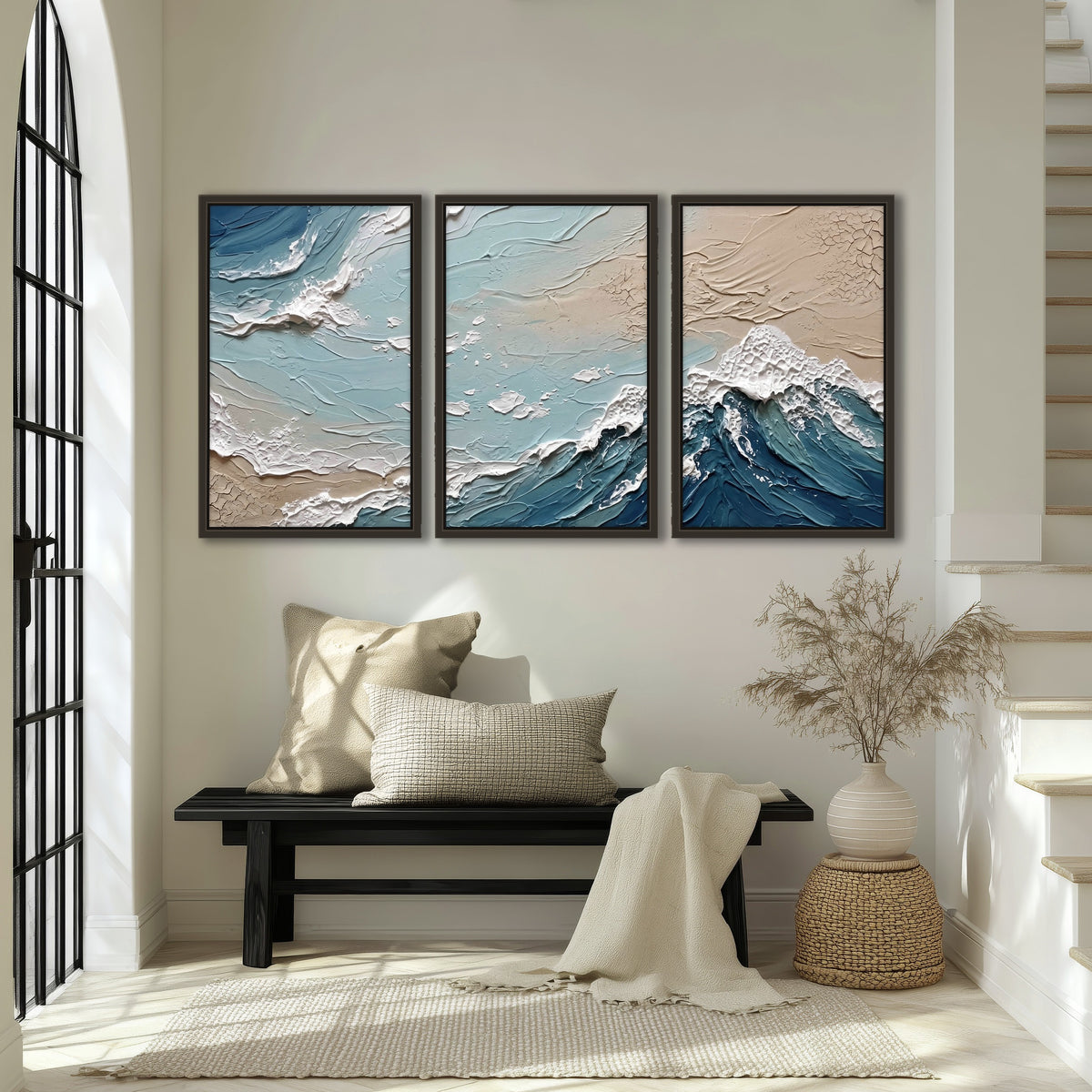 Textured ocean wave painting 3 piece framed canvas in an entryway above a bench