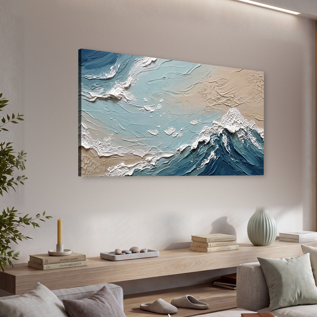 Textured ocean wave painting canvas wall art in a living room above a console