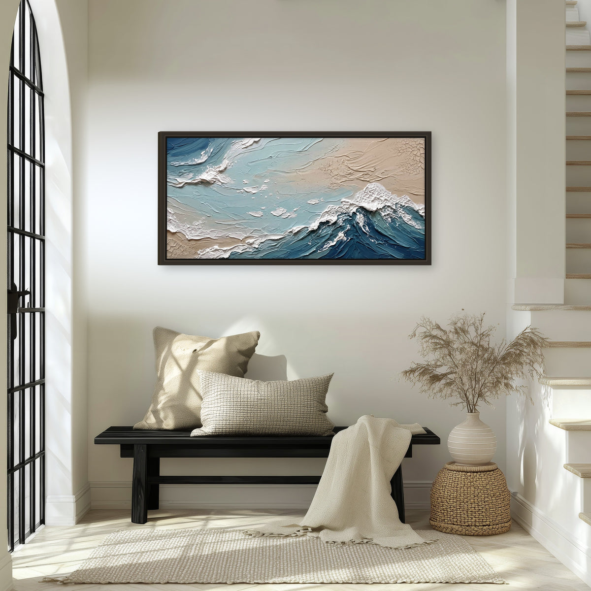 Textured ocean wave painting framed canvas wall art in an entryway above a bench