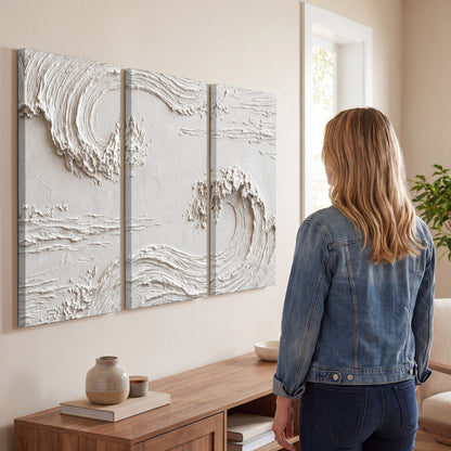 White plaster wave art 3 piece canvas wall art in a living room