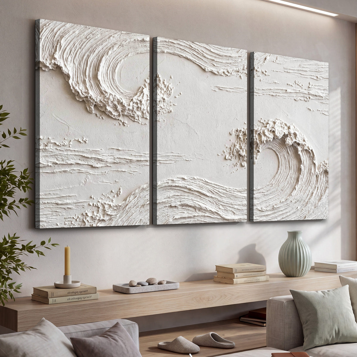 White plaster wave art 3 piece canvas wall art in a living room above a console