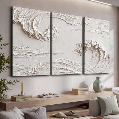 White plaster wave art 3 piece canvas wall art in a living room above a console