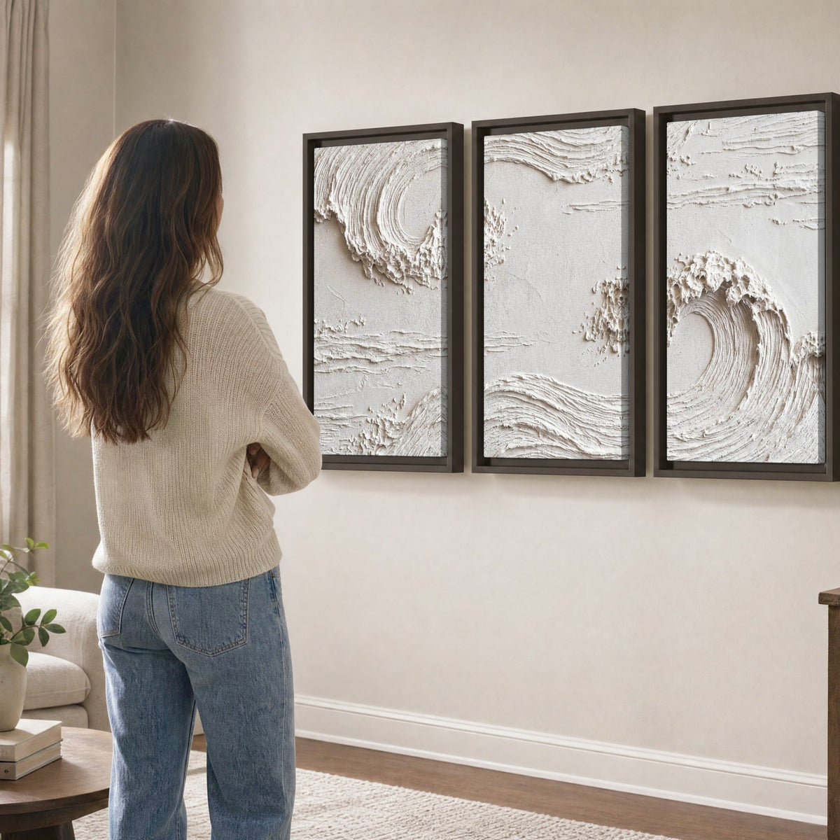 White plaster wave art 3 piece framed canvas in a living room