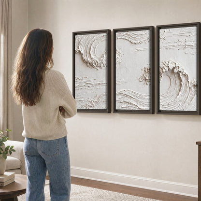 White plaster wave art 3 piece framed canvas in a living room