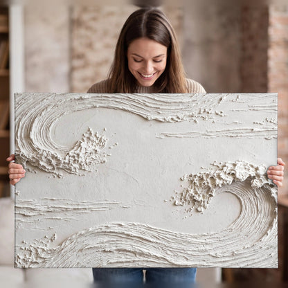 White plaster wave art canvas wall art held in hands