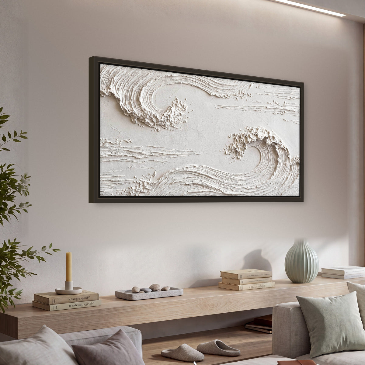 White plaster wave art framed canvas wall art in a living room above a console