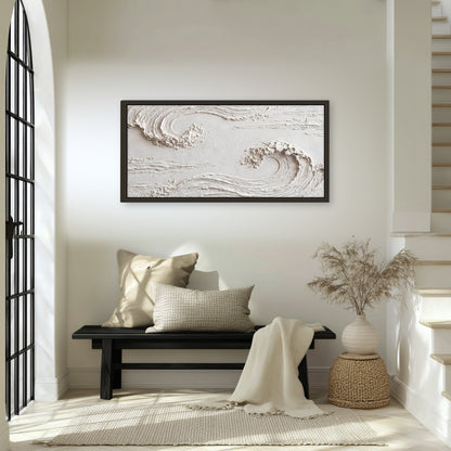 White plaster wave art framed canvas wall art in an entryway above a bench