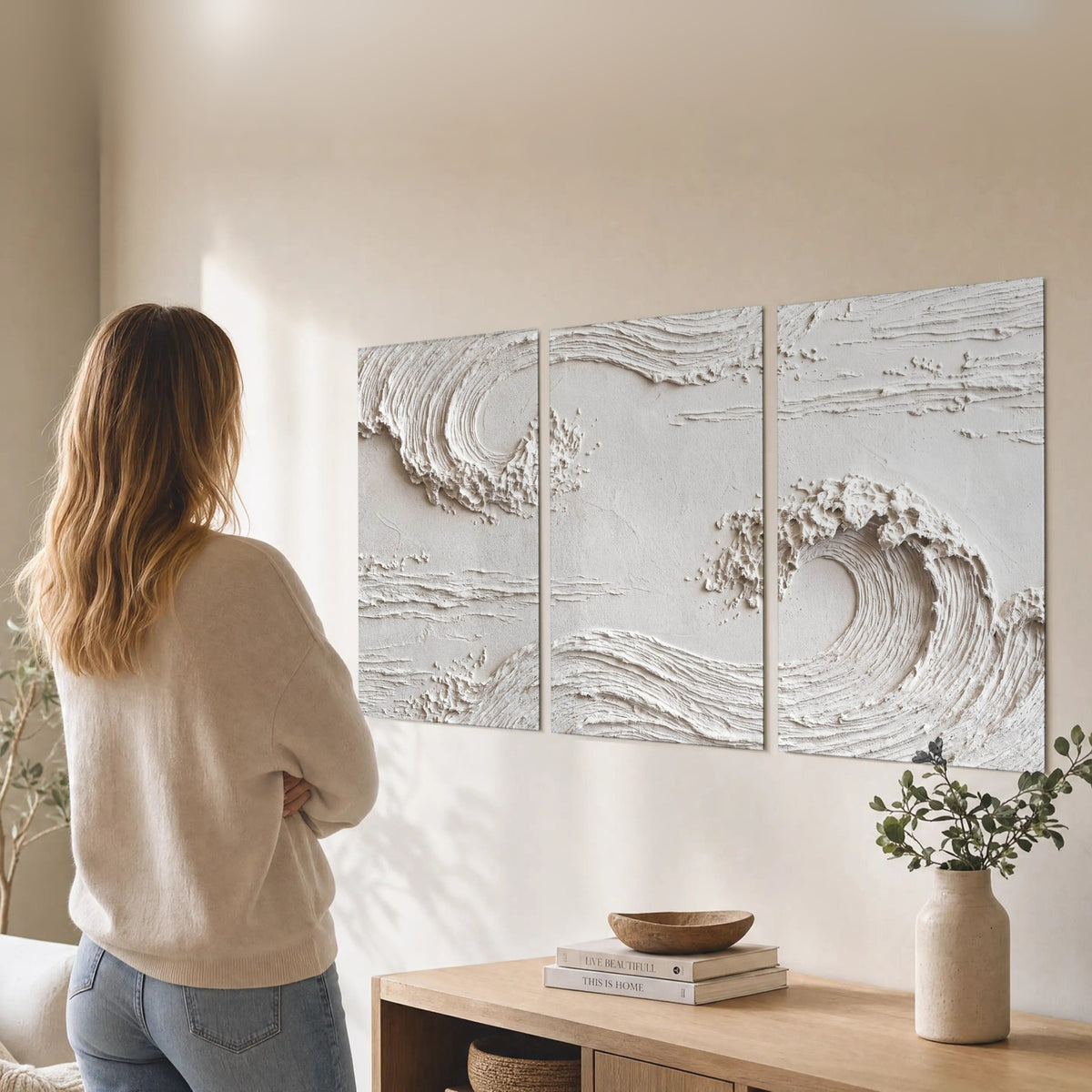 White plaster wave art set of 3 poster prints in a living room