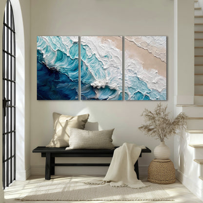 Turquoise ocean wave painting 3 piece canvas wall art in an entryway above a bench