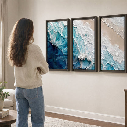 Turquoise ocean wave painting 3 piece framed canvas in a living room