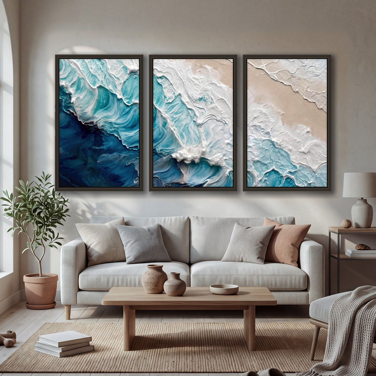 Turquoise ocean wave painting 3 piece framed canvas in a bright living room