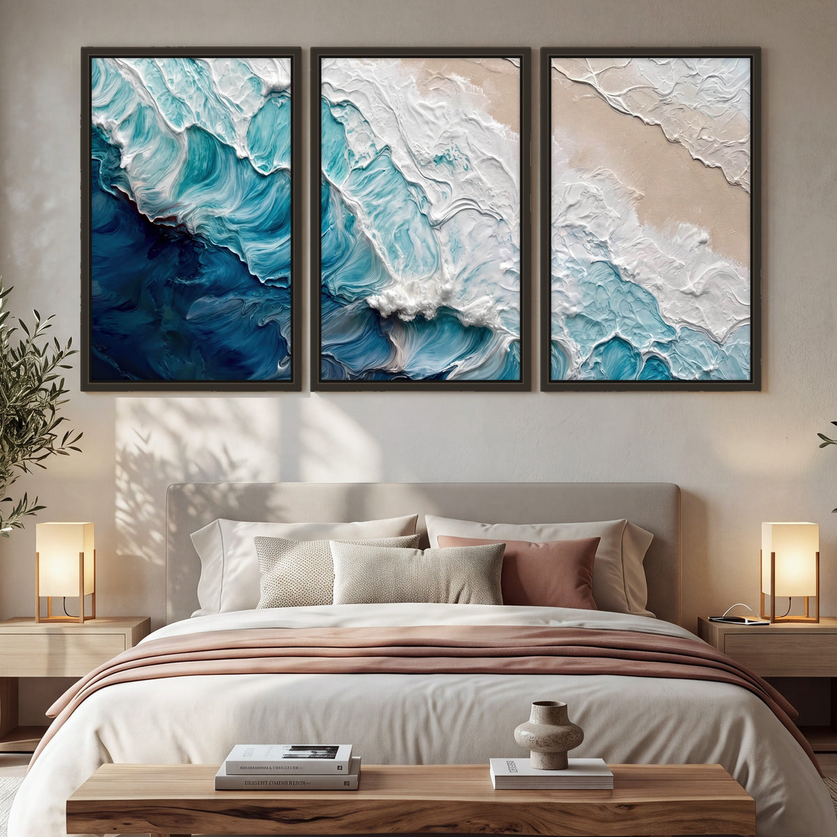 Turquoise ocean wave painting 3 piece framed canvas in a bedroom above the bed