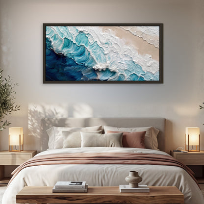 Turquoise ocean wave painting framed canvas wall art in a bedroom above the bed