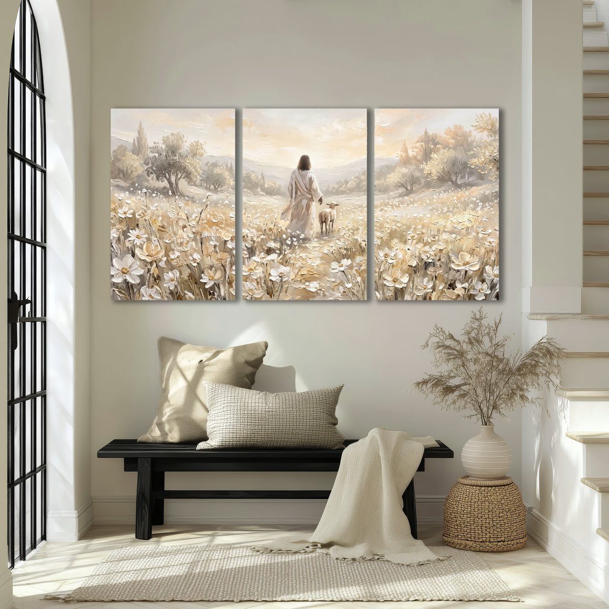 Jesus and lamb flower field painting 3 piece canvas wall art in an entryway above a bench