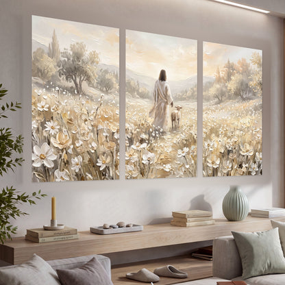 Jesus and lamb flower field painting set of 3 poster prints in a living room above a console