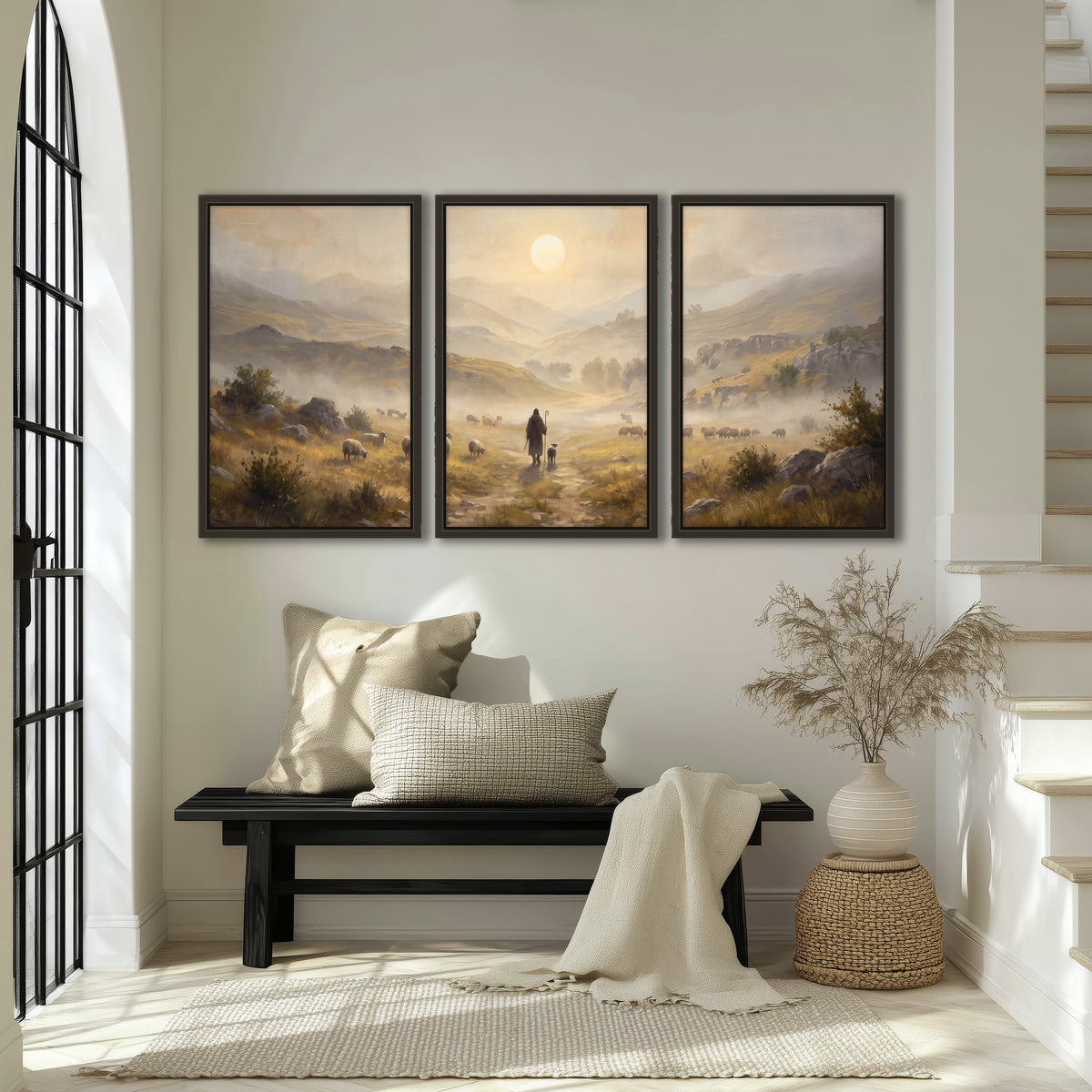 Shepherd and flock painting 3 piece framed canvas in an entryway above a bench