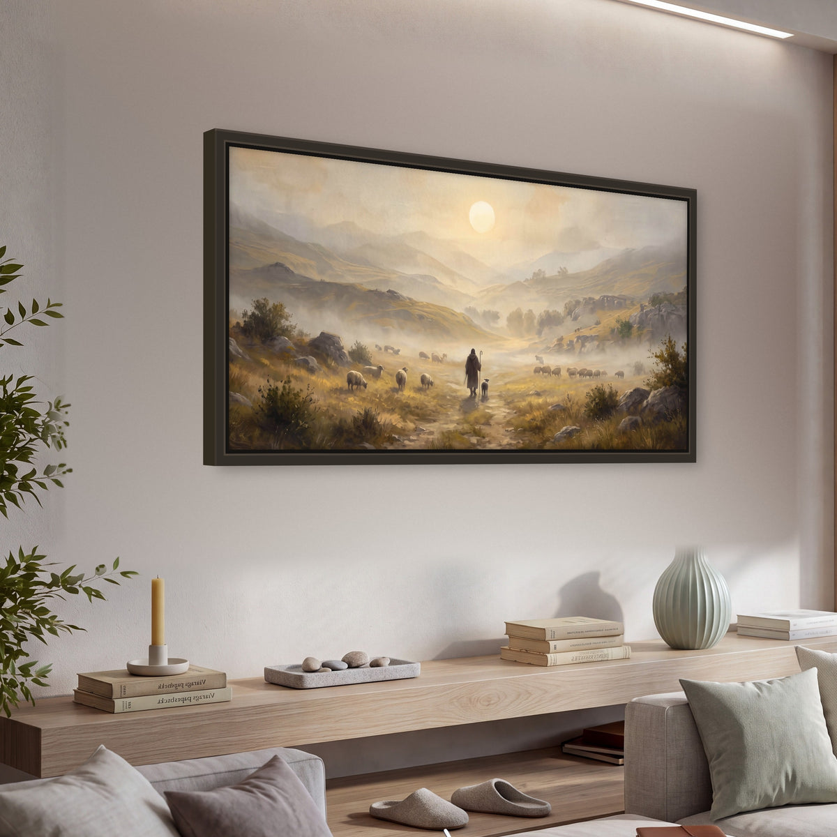 Shepherd and flock painting framed canvas wall art in a living room above a console