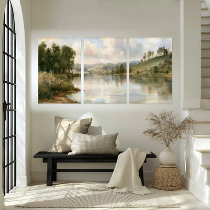 Pastel river valley painting set of 3 poster prints in an entryway above a bench