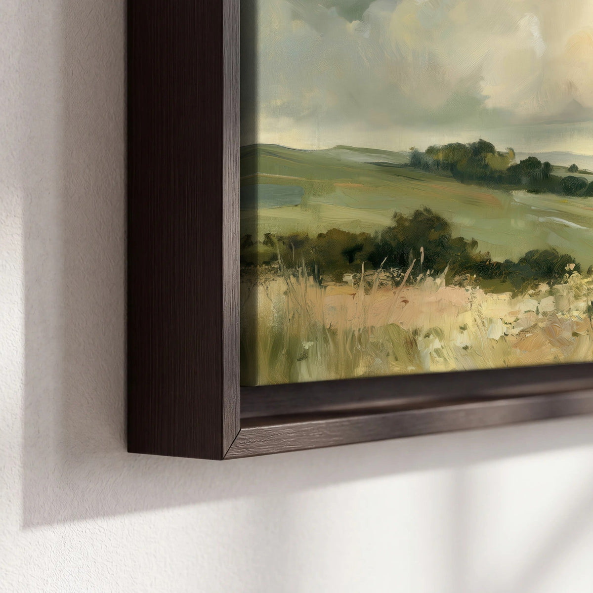 Sunlit meadow hills painting framed canvas close-up showing the floating frame