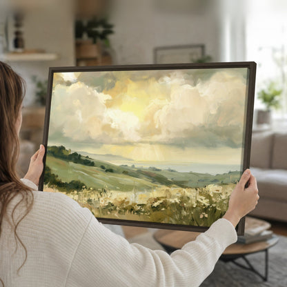 Sunlit meadow hills painting framed canvas held in hands