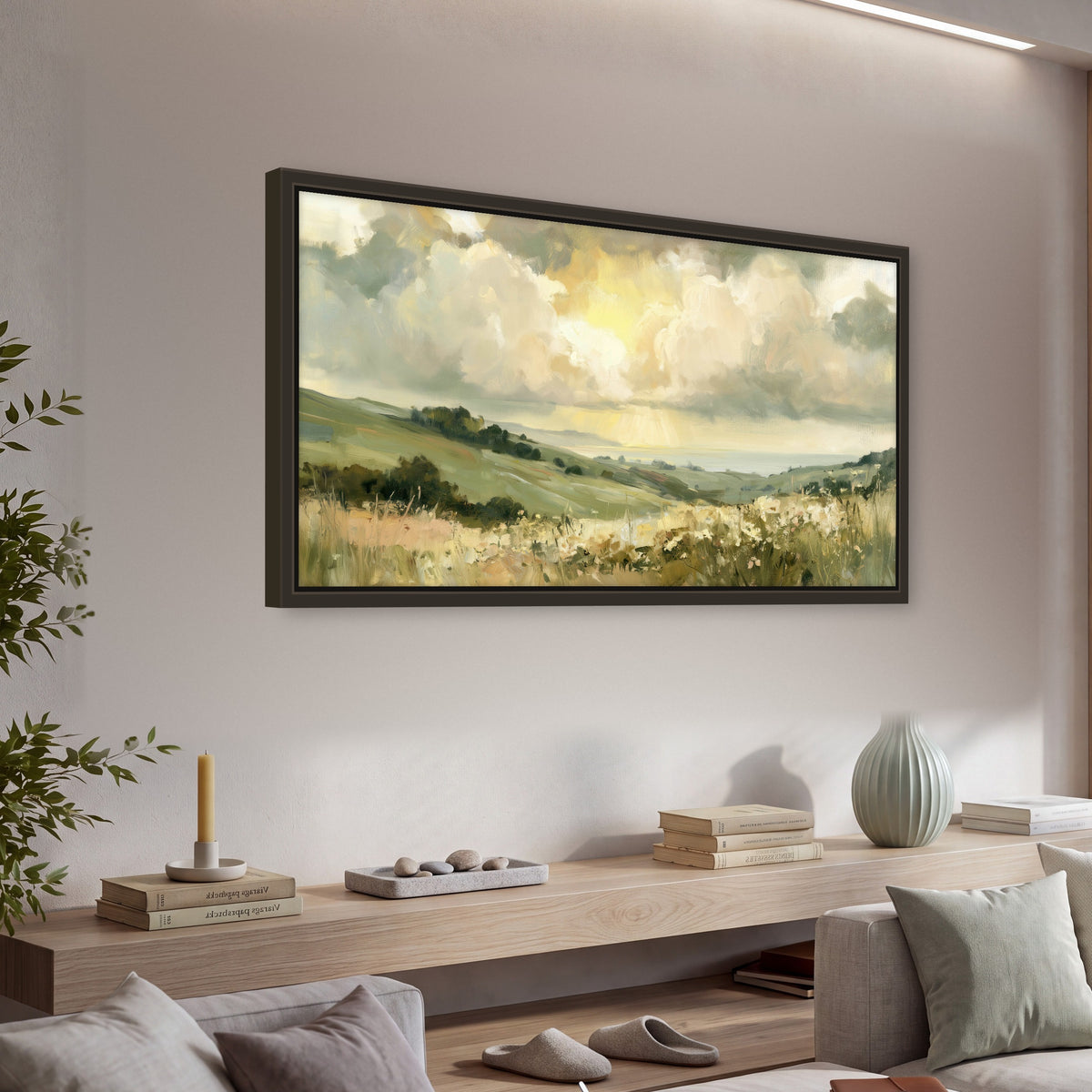 Sunlit meadow hills painting framed canvas wall art in a living room above a console