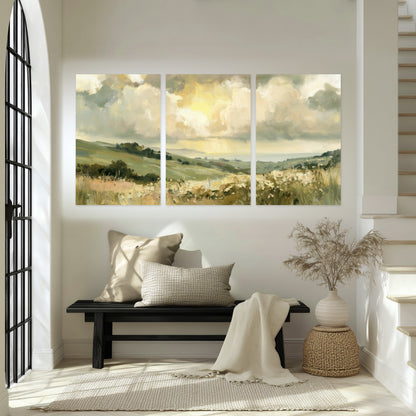 Sunlit meadow hills painting set of 3 poster prints in an entryway above a bench