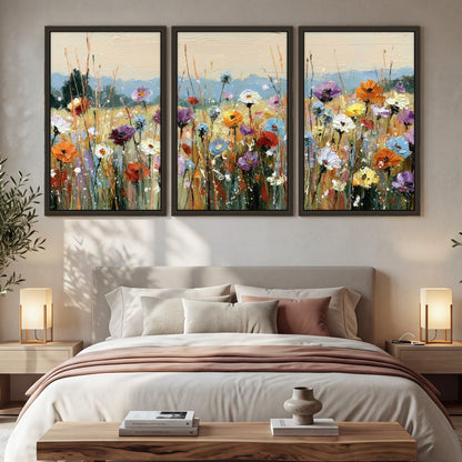 Colorful wildflower meadow painting 3 piece framed canvas in a bedroom above the bed